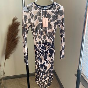 Mesh swim cover up from Missguided. Never worn. Brand new with tag!